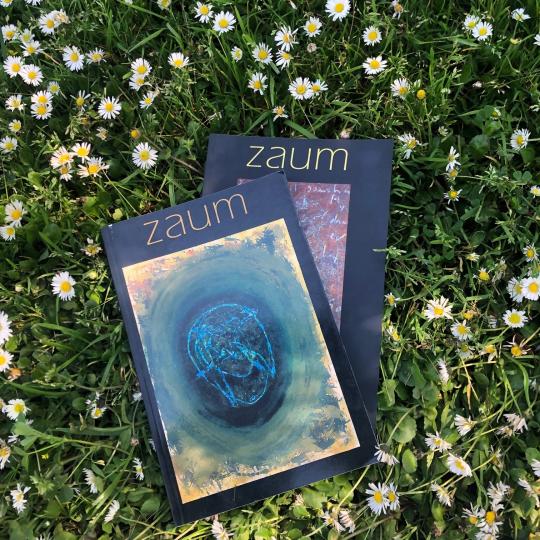 Issues of zaum on a bed of grass and flowers